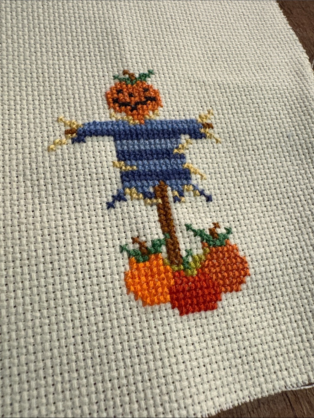 Pumpkin Scarecrow completed cross stitch